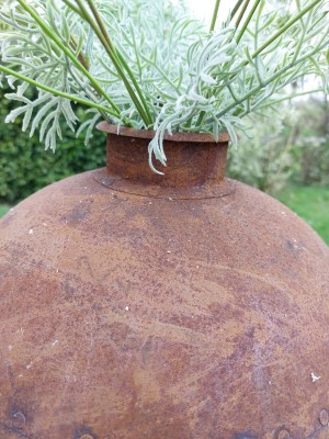 Roestige kruik 
